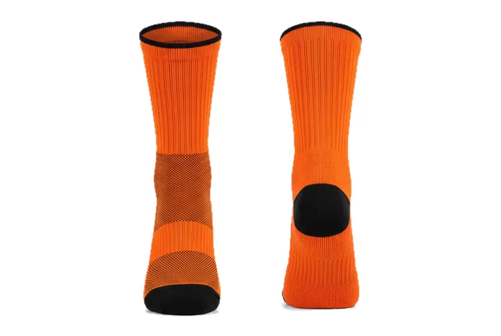 Ghost mannequin photograph of the Bird's eye Tipped cuff and toe custom jersey design, front and back views side by side